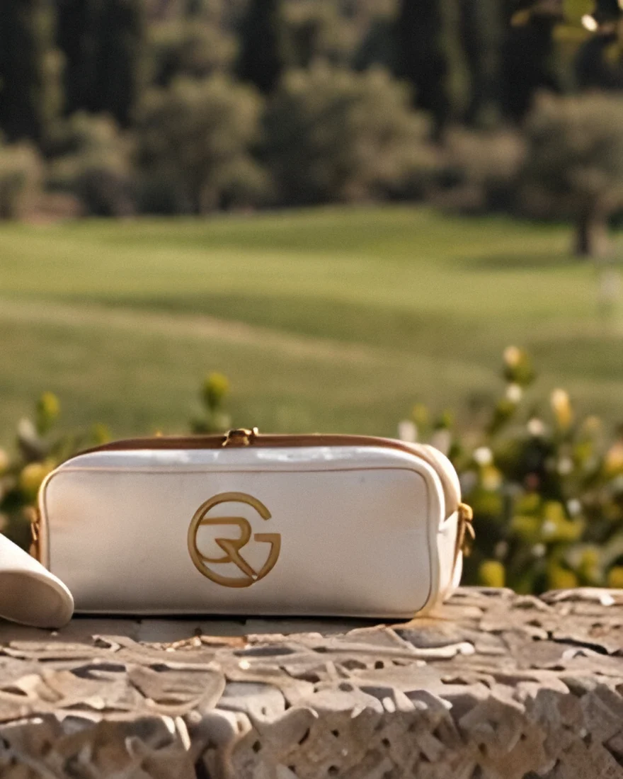 Cream GasaRoca pouch with gold monogram
